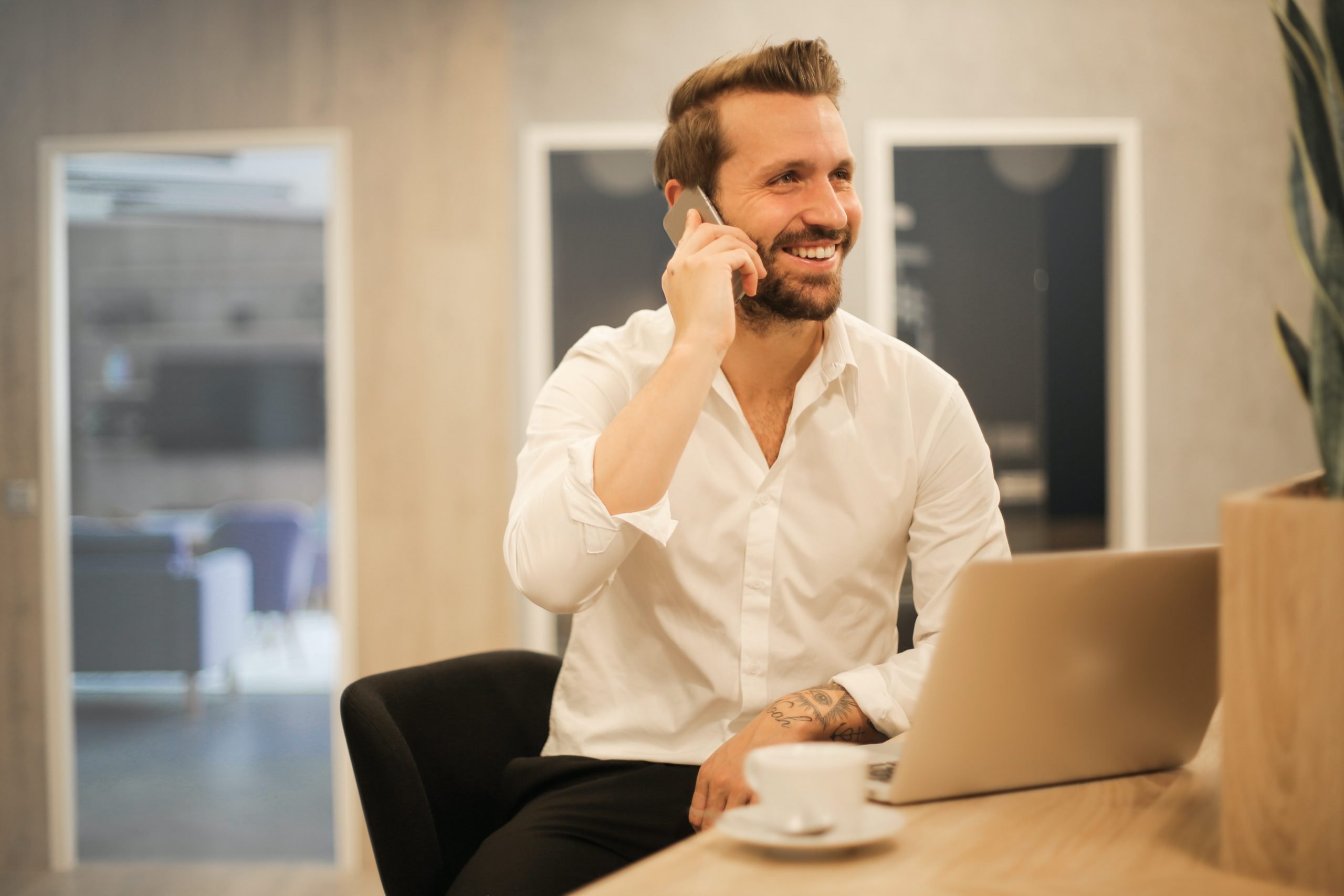 An happy man on the phone